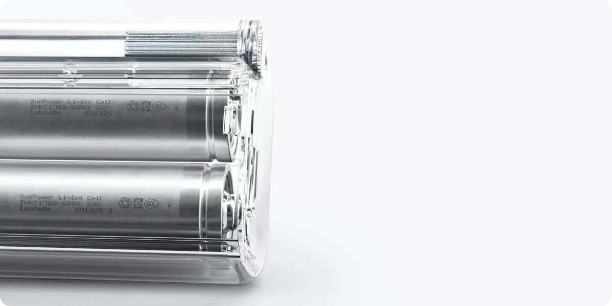 Three cylindrical metal components on a white background